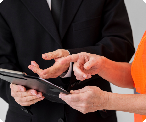 Professionals reviewing information on a tablet together